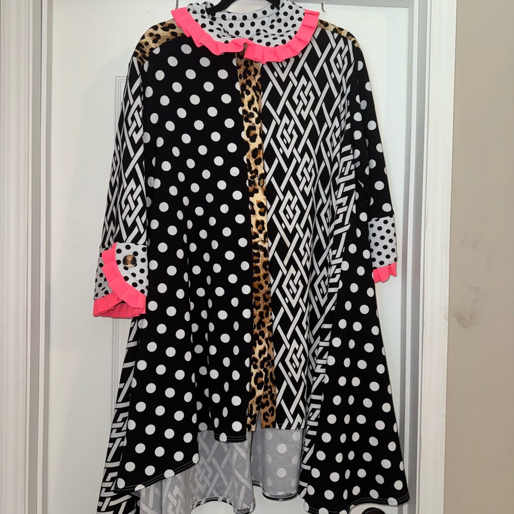 Black and White Geometric Cape with Coral Accents